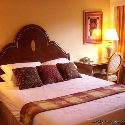 Golden Green Hotel - Charlotte Kamer foto